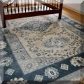 DR01. Rug blue and ivory. Measures approx. 12' x 15' 